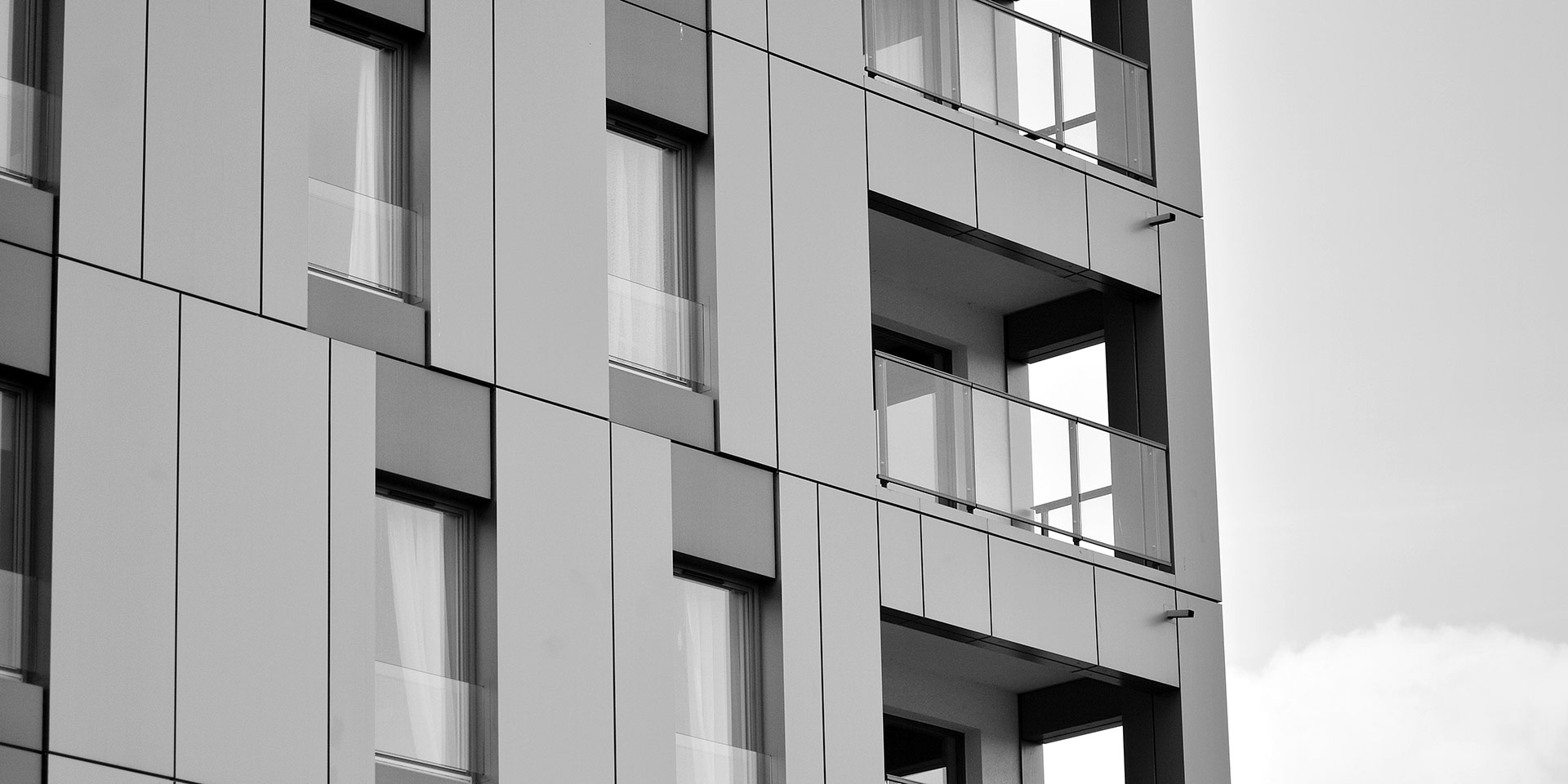 facade of a mon apartment building. black and white. stock photo