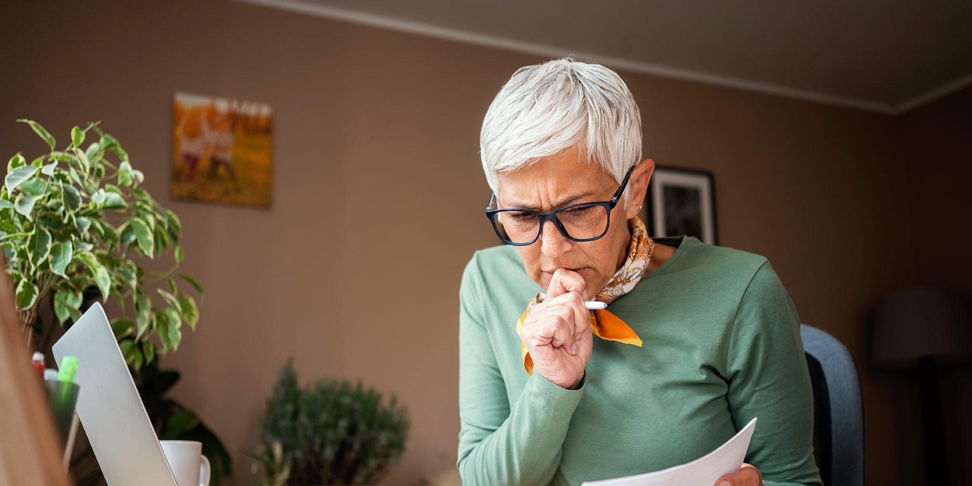 mature man rking indoors at home, during quarantine caused by corona virus covid-19